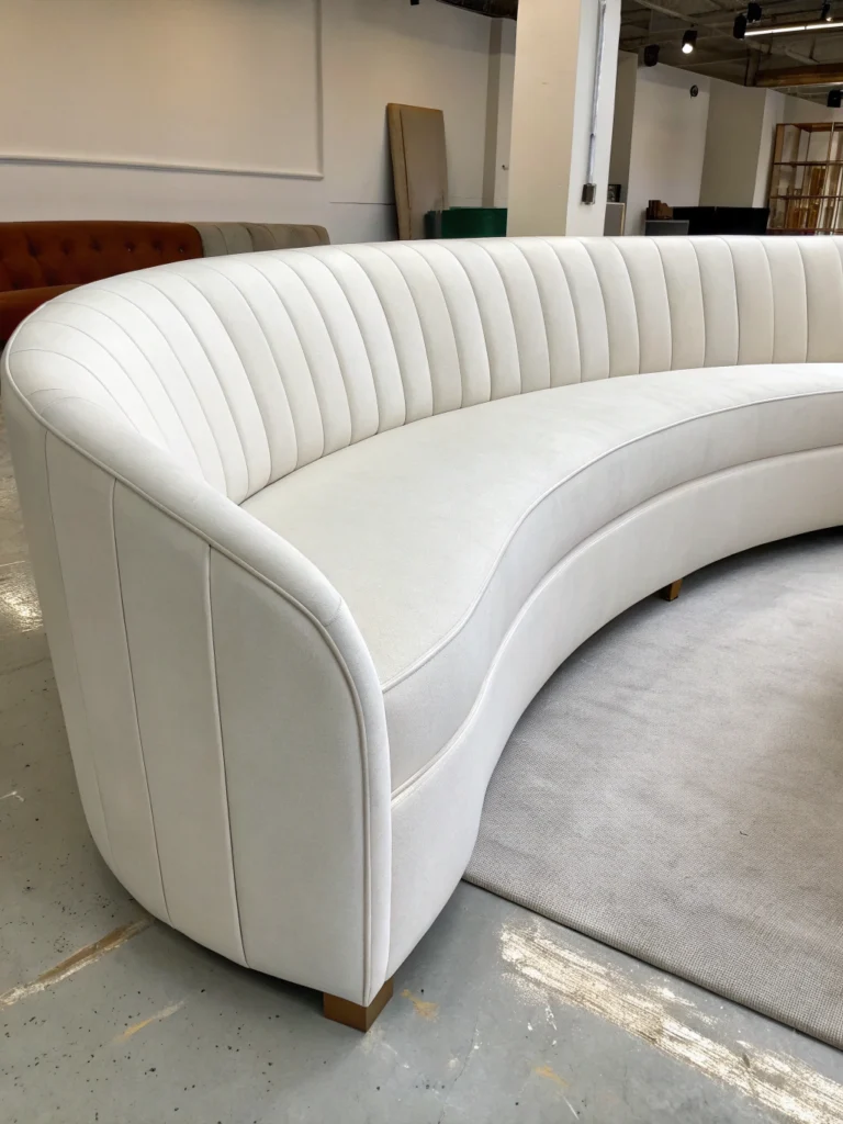 white curved sofa