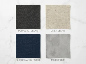 Sectional sofa fabric comparison – polyester blend, linen blend, performance fabric, and microfiber swatches on marble surface