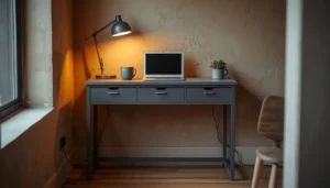 grey console table with built-in outlet used as home office setup in a small studio apartment